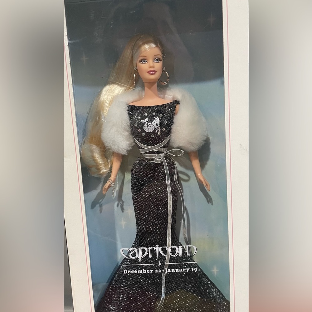 Barbie from the 2004 Pink Collection. The Zodiac Capricorn.